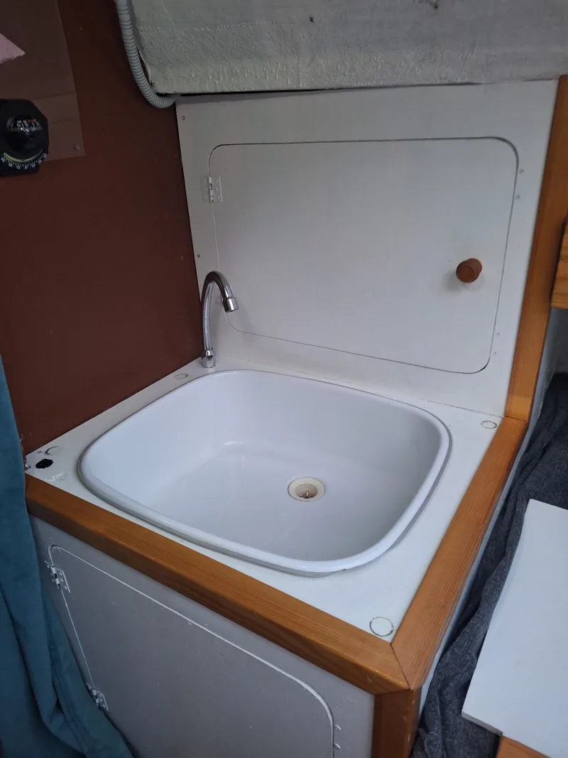 Sink with the compass mounted above