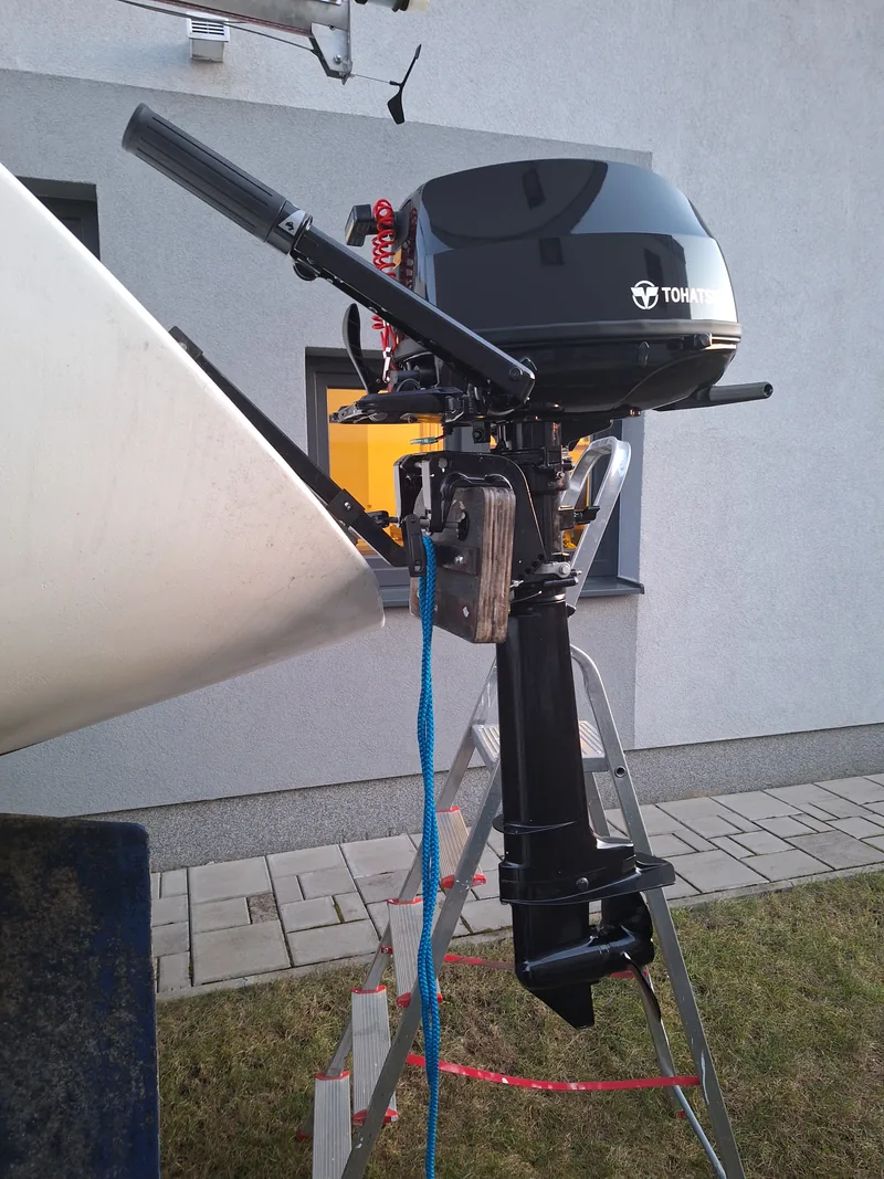 The Tohatsu outboard mounted on the transom bracket